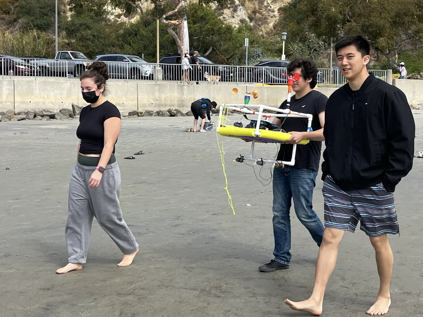 Carrying the Basilisk robot down to the water at Dana Point